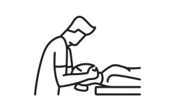 A minimalist black-and-white line drawing shows a chiropractor performing an adjustment on a patient. The patient is lying face down on a table, while the chiropractor stands beside them, pressing down on the patient's back with both hands.